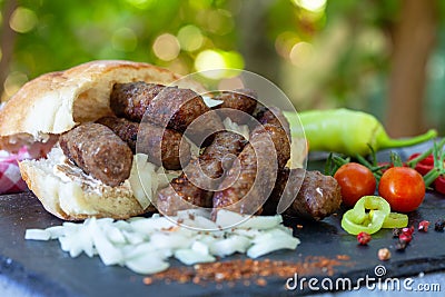 Traditional Balkan food - cevapi or cevapcici Stock Photo