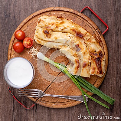 Traditional balkan meal - Burek or Borek pie with cheese Stock Photo