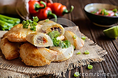 Traditional beef Empanadas with Aji Picante sauce Stock Photo