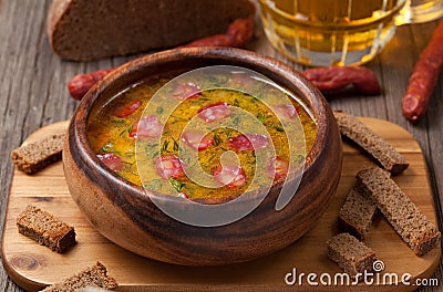 Traditional beer soup with cheese sausage dill Stock Photo