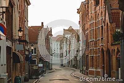 traditional belgian architecture on old narrow street in bruges Editorial Stock Photo