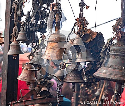 Traditional bells at hindu temple Stock Photo