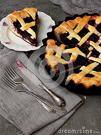 Traditional berries yeast pie tart on rustic wooden background. Homemade sweet cake. Baked pastry food. Top view. Space for text Stock Photo