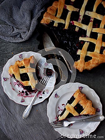 Traditional berries yeast pie tart on rustic wooden background. Homemade sweet cake. Baked pastry food. Top view. Space for text Stock Photo