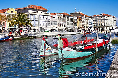 Traditional boats on the canal in Aveiro Stock Photo