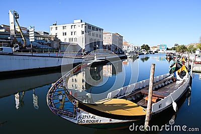 Traditional boats on the canal in Aveiro Stock Photo
