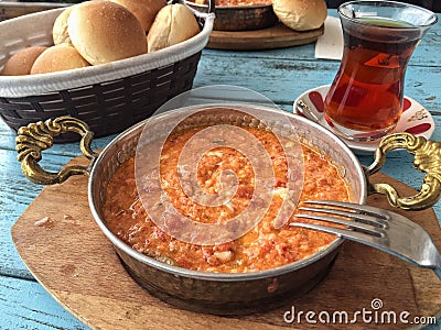 traditional breakfast with omelet and turkish tea on wooden table Stock Photo