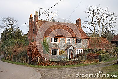 Traditional Brick and Flint English farmhouse Stock Photo