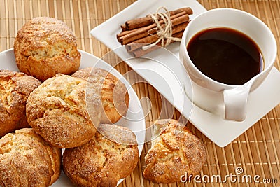 Traditional bulgarian cookies, called kurabiiki, cup of coffee and tied cinnamon sticks. Warm and delicious autumn breakfast Stock Photo