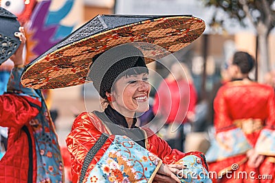 Traditional carnival in a Spanish town Palamos in Catalonia. Many people in costume and interesting make-up. 03. 03. 2019 Spain Editorial Stock Photo