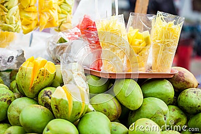 Traditional cart of an street vendor of tropical fruits in the city of Cali in Colombia Stock Photo