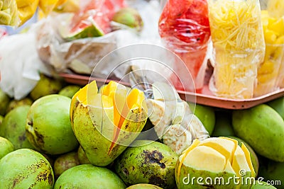 Traditional cart of an street vendor of tropical fruits in the city of Cali in Colombia Stock Photo