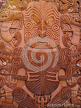 Traditional Carved Maori Board. Red wood Editorial Stock Photo