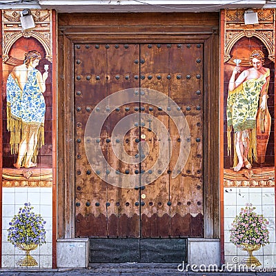 Traditional ceramic Azulejos decorating a door in Triana, Seville Editorial Stock Photo