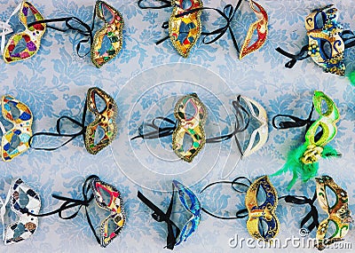 Traditional colorful decorated venetian masks for sale in Venice Stock Photo