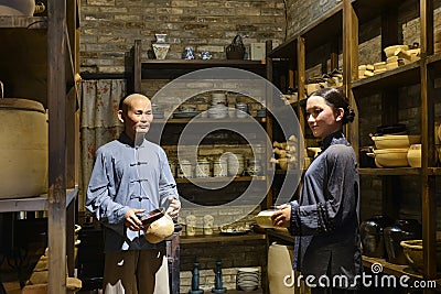 Traditional Chinese ceramic shop,Wax figure ,China culture art Editorial Stock Photo