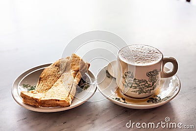 Traditional Chinese coffee and toast bread, popular breakfast in Malaysia Stock Photo