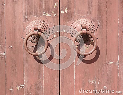 knocker on old wood wooden door Stock Photo