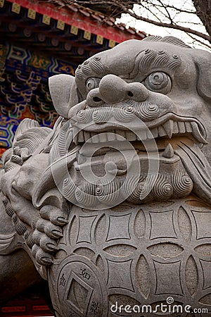 Traditional Chinese lion at the entrance of the temple in Shandong, Penglai pavilion Stock Photo