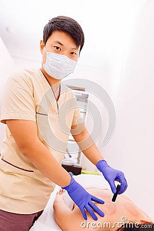 Traditional chinese moxibustion procedure Stock Photo