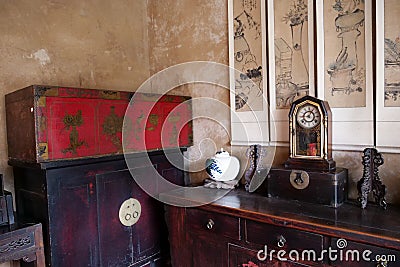 Traditional Chinese Residences interior retro decoration chair cabinet vase and scroll painting in Tianshui Folk Arts Museum Hu Editorial Stock Photo