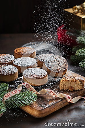 Traditional Christmas cookies with almonds and sesame on dark wooden background with copy space Stock Photo