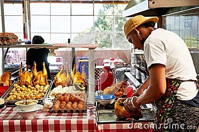 Traditional Colombian food restaurant run by the cook Editorial Stock Photo