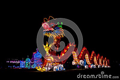 Traditional colorful chinese lion over black background. Editorial Stock Photo