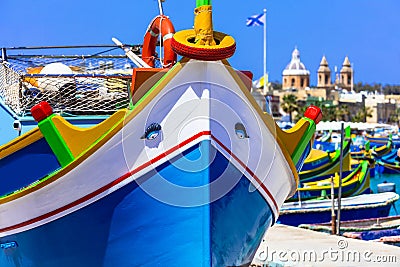 Traditional colorful fishing boats luzzu un Malta Stock Photo
