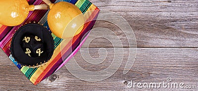 Traditional colorful objects for Cinco de Mayo holiday celebration on rustic wooden boards Stock Photo