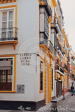 Traditional colourful buildings on the corner of Javier Lasso De La Vega street in Seville, Spain Editorial Stock Photo