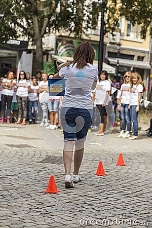 Traditional competition with yoke and 2 buckets in Plovdiv, Bulgaria Editorial Stock Photo