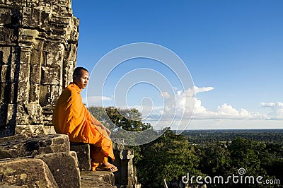 Traditional Contemplating Monk in Cambodia Concept Stock Photo