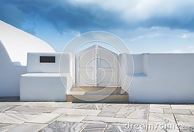 Traditional courtyard entrance in the village of Oia, Santorini, Greece. Traditional architecture. Stock Photo