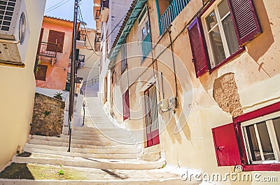 Traditional cozy greek street in city Nafplio, Greece Stock Photo