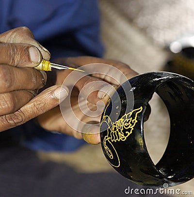 Traditional craft work painting on object called l Stock Photo