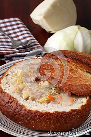 Traditional Czech cabbage soup in a bread bowl Stock Photo