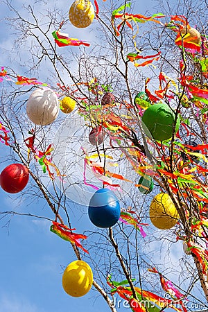 Traditional Czech easter decoration - decorated birch tree Betula pendula with colorful ribbons and painted eggs - rural symbol Stock Photo