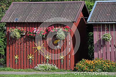 Traditional decorated small architecture in Juodkrante, Lithuania Stock Photo