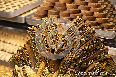 Traditional delicious turkish dessert baklava in the shop window showcase. Different kinds of turkish delights. Popular Stock Photo