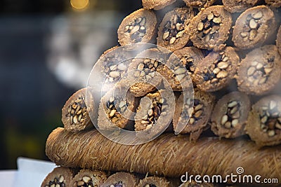 Traditional delicious turkish desserts in the shop window showcase. Different kinds of turkish delights. Popular Stock Photo