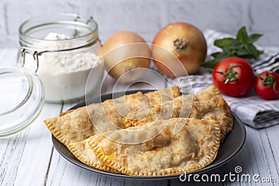 Traditional delicious Turkish foods,minced meat in savoury pastry (Turkish name ci borek or cig borek Stock Photo