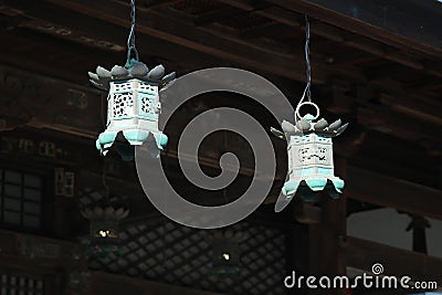 Hanging bronze lanterns in a Buddhism temple Stock Photo