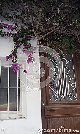 The traditional design of the front door in Greece. Stock Photo