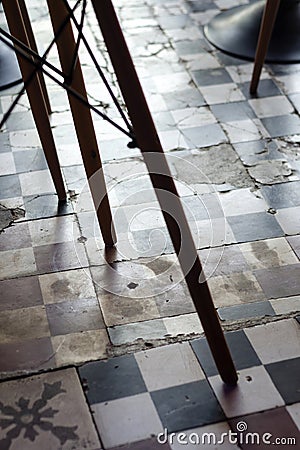 Traditional design old rustic floor tiles detail in spanish cafe Stock Photo