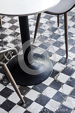 Traditional design old rustic floor tiles detail in spanish cafe Stock Photo