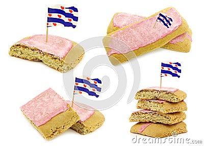 Traditional Dutch and Frisian pink glazed pastry called `fondant koek` with a frisian flag toothpick Stock Photo