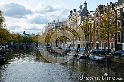 Traditional Dutch old houses on the canals in Amsterdam Editorial Stock Photo