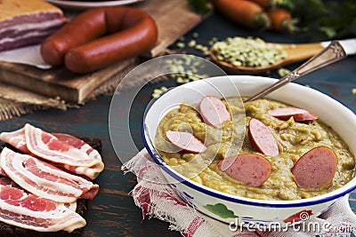 Traditional Dutch pea soup on a rustic table Stock Photo