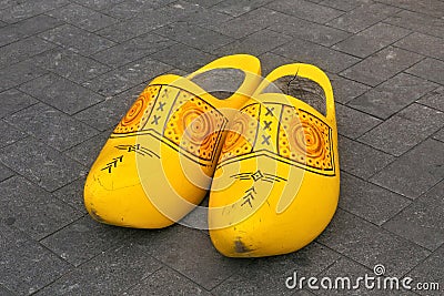 Traditional Dutch wooden big klomps shoes also known as clogs or klompen. Stock Photo